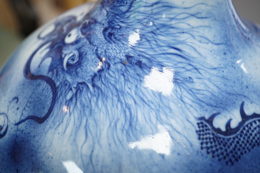 A Chinese blue and white ‘dragon’ bottle vase, 19th century